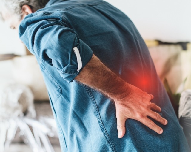 Man suffering from back pain